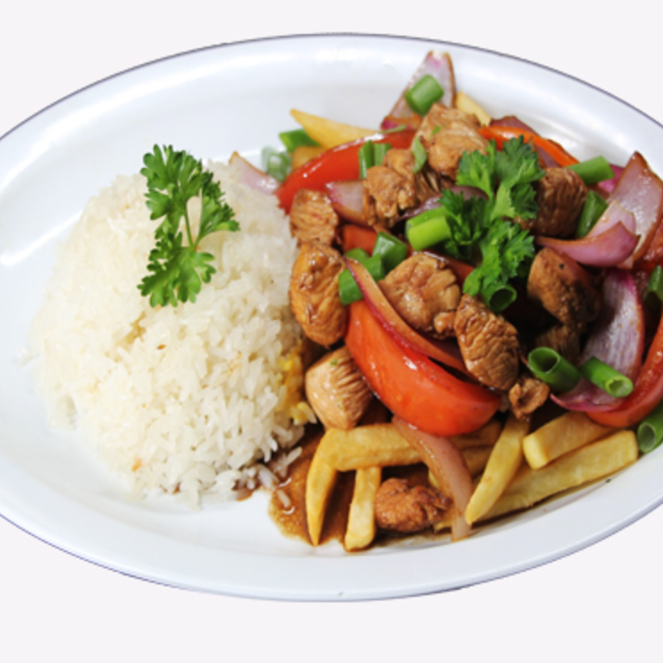 Speedy Tacos and Chicken's Lomo Saltado with rice, steak, fries, red onions, and tomatoes.